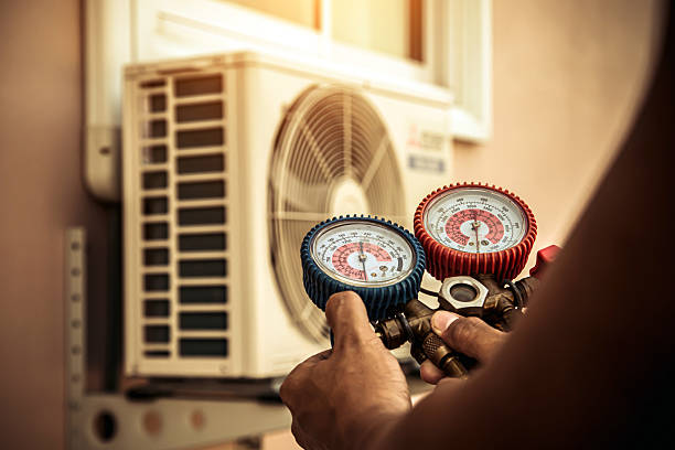 Professional Air Conditioning Service technician working in Roslyn, PA